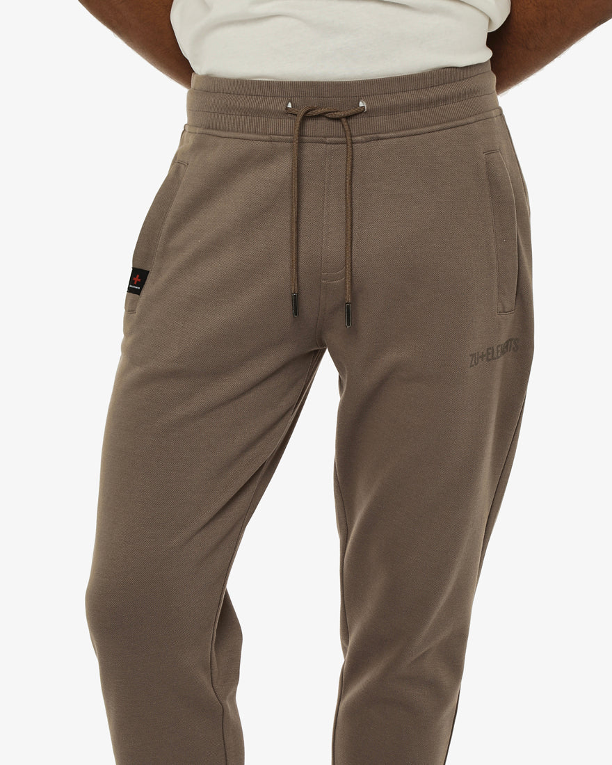 Pantaloni felpa in piquet con tasche con zip