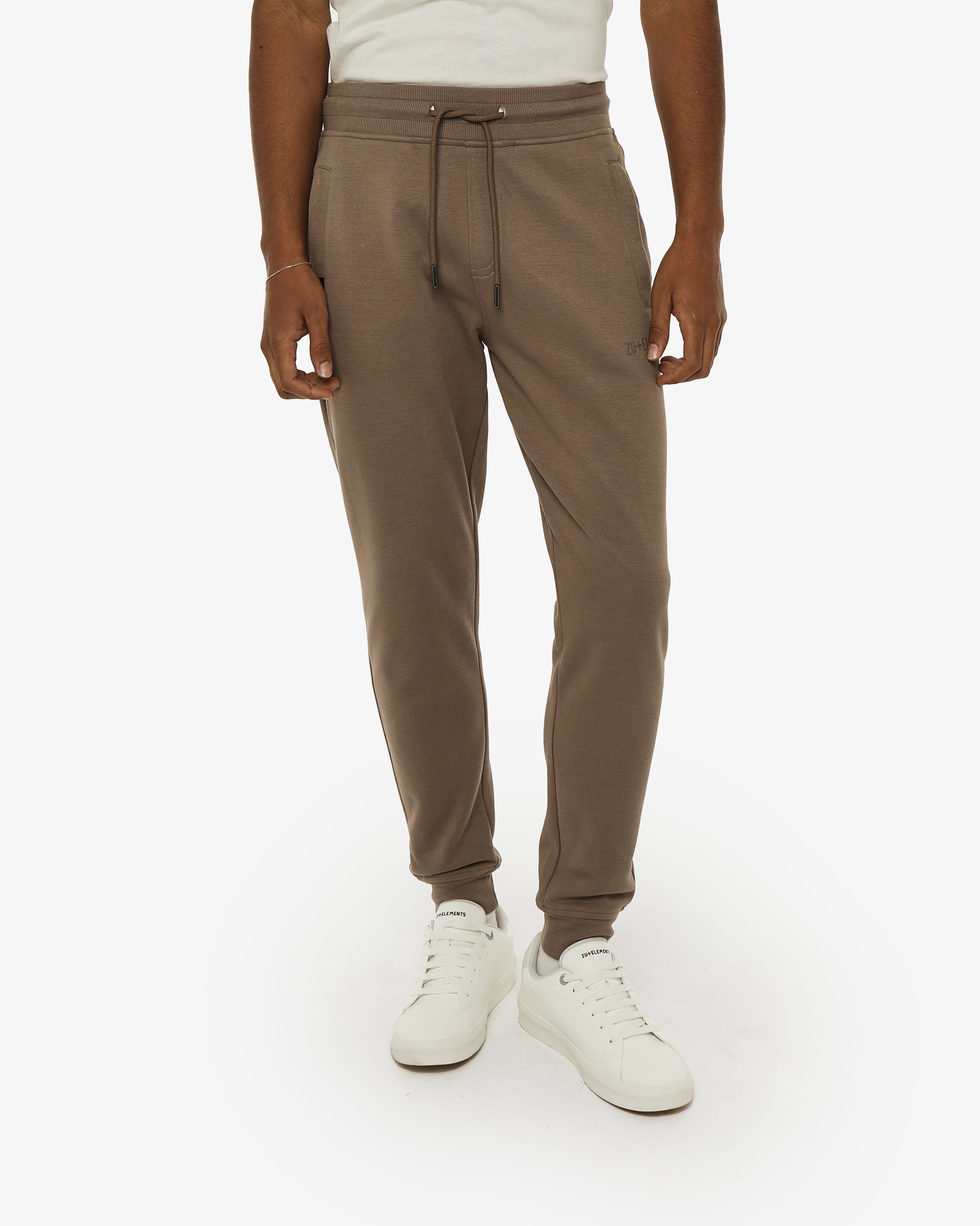 Pantaloni felpa in piquet con tasche con zip