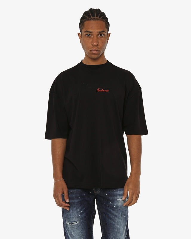 T-shirt girocollo maniche corte relaxed fit con taglio spalla e ricamo frontale