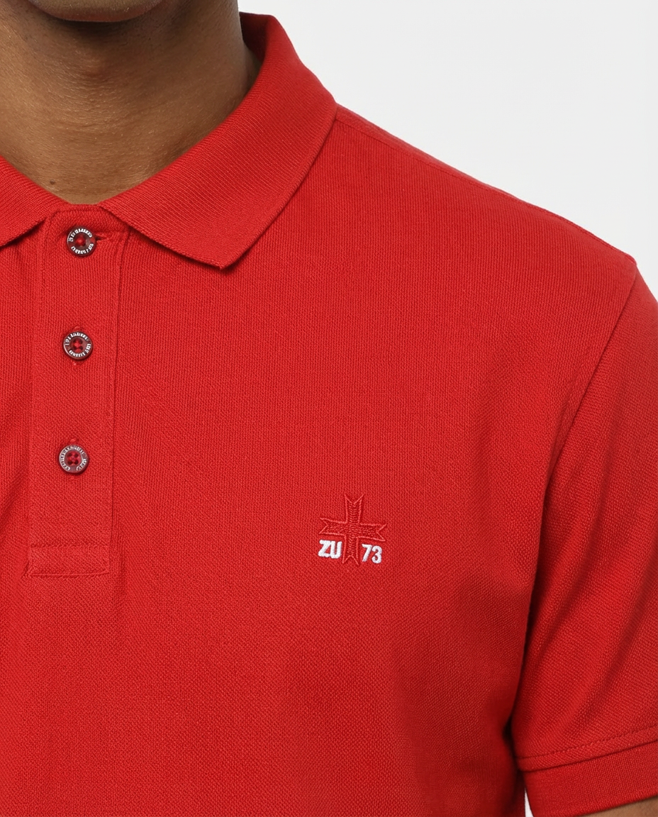 Polo piquet in puro cotone con logo ricamato e bottoni logati
