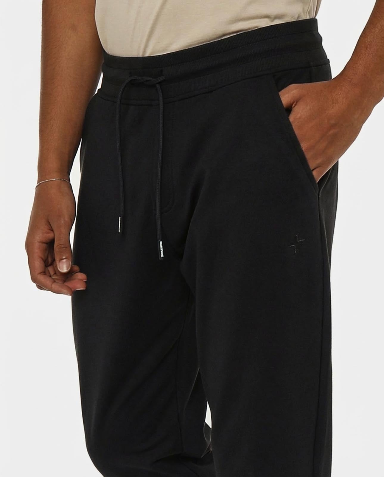 Pantaloni felpa con logo ricamato sul davanti, vita e fondo a coste