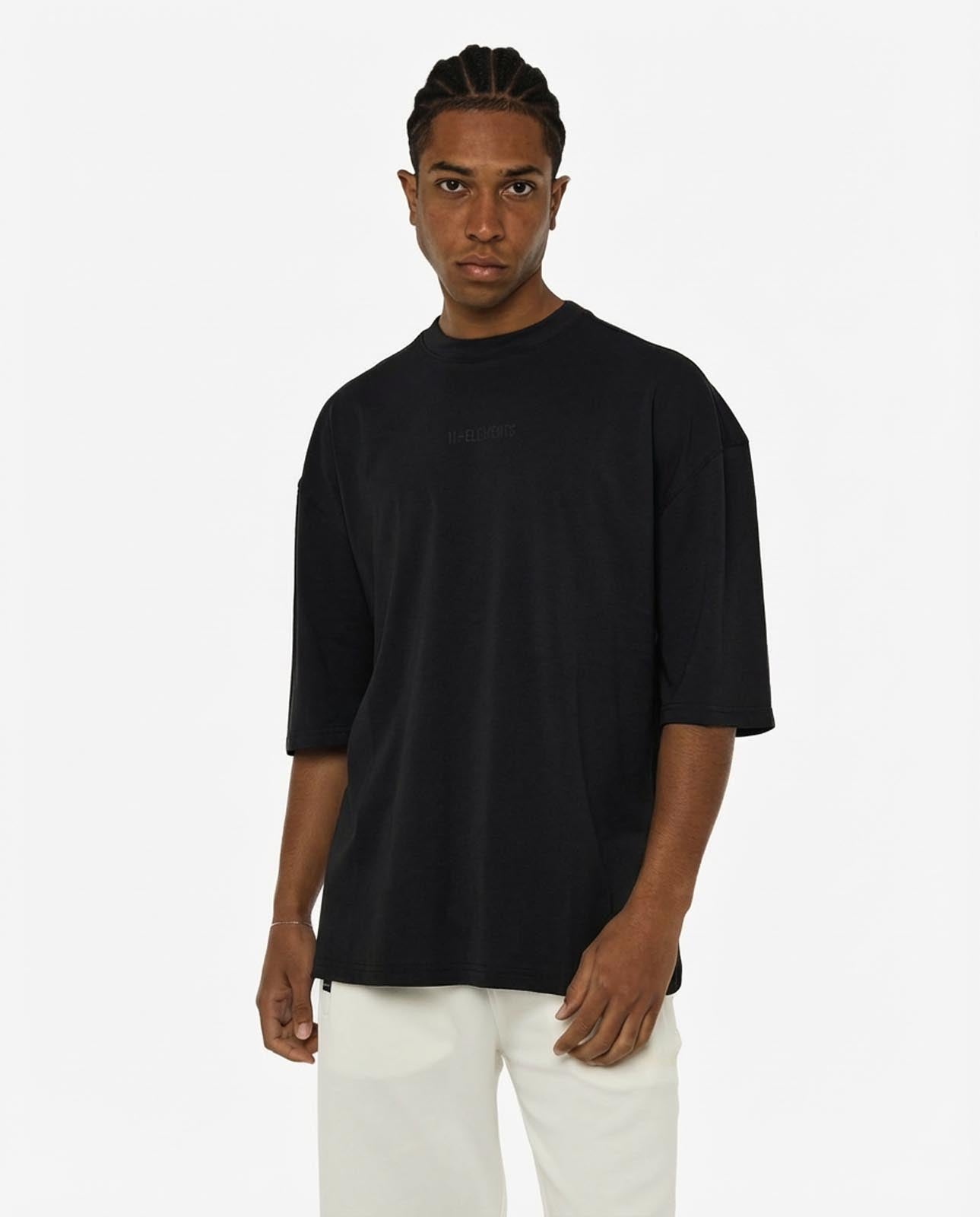 T-shirt girocollo maniche corte relaxed fit, taglio spalla e stampa frontale