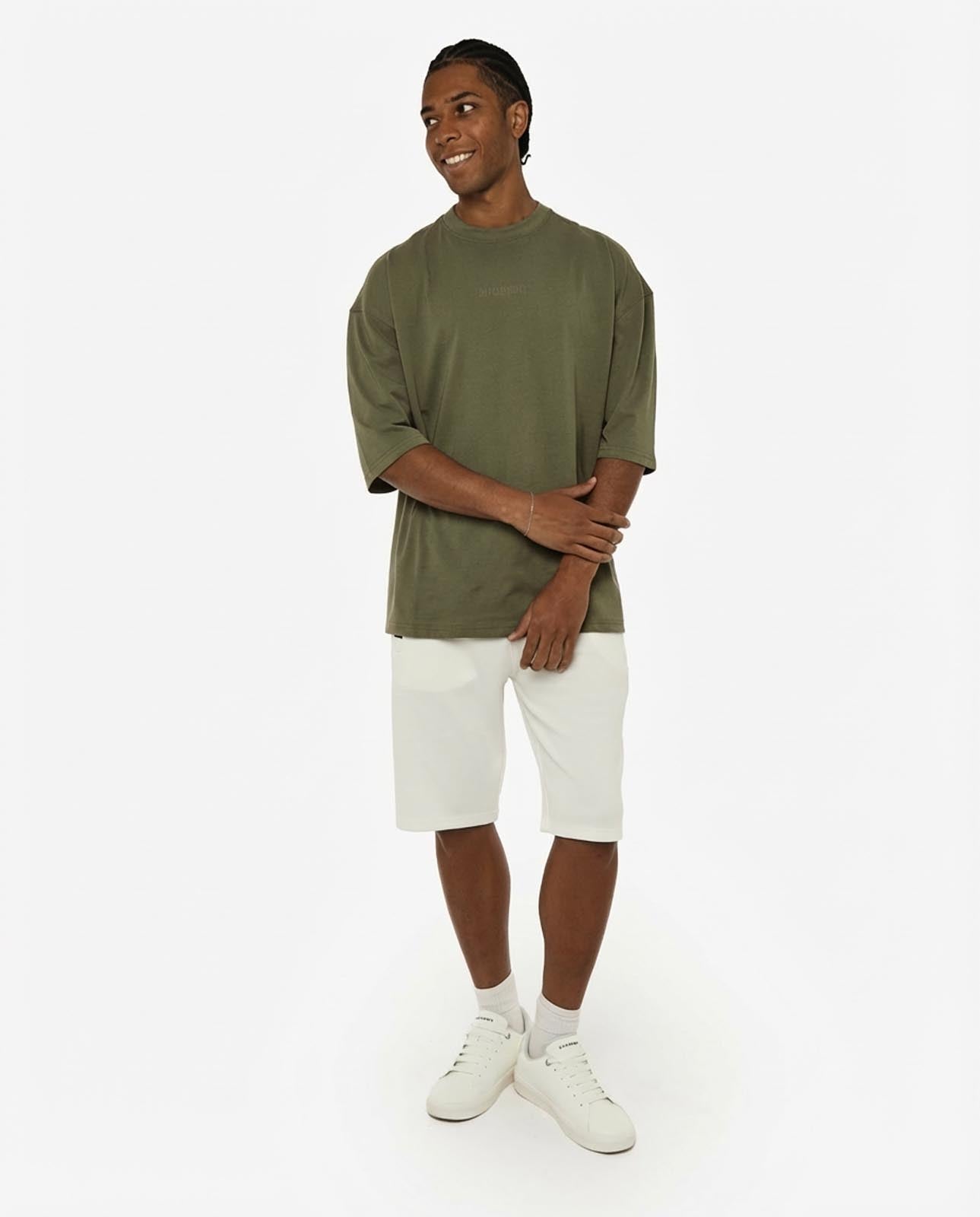 T-shirt girocollo maniche corte relaxed fit, taglio spalla e stampa frontale