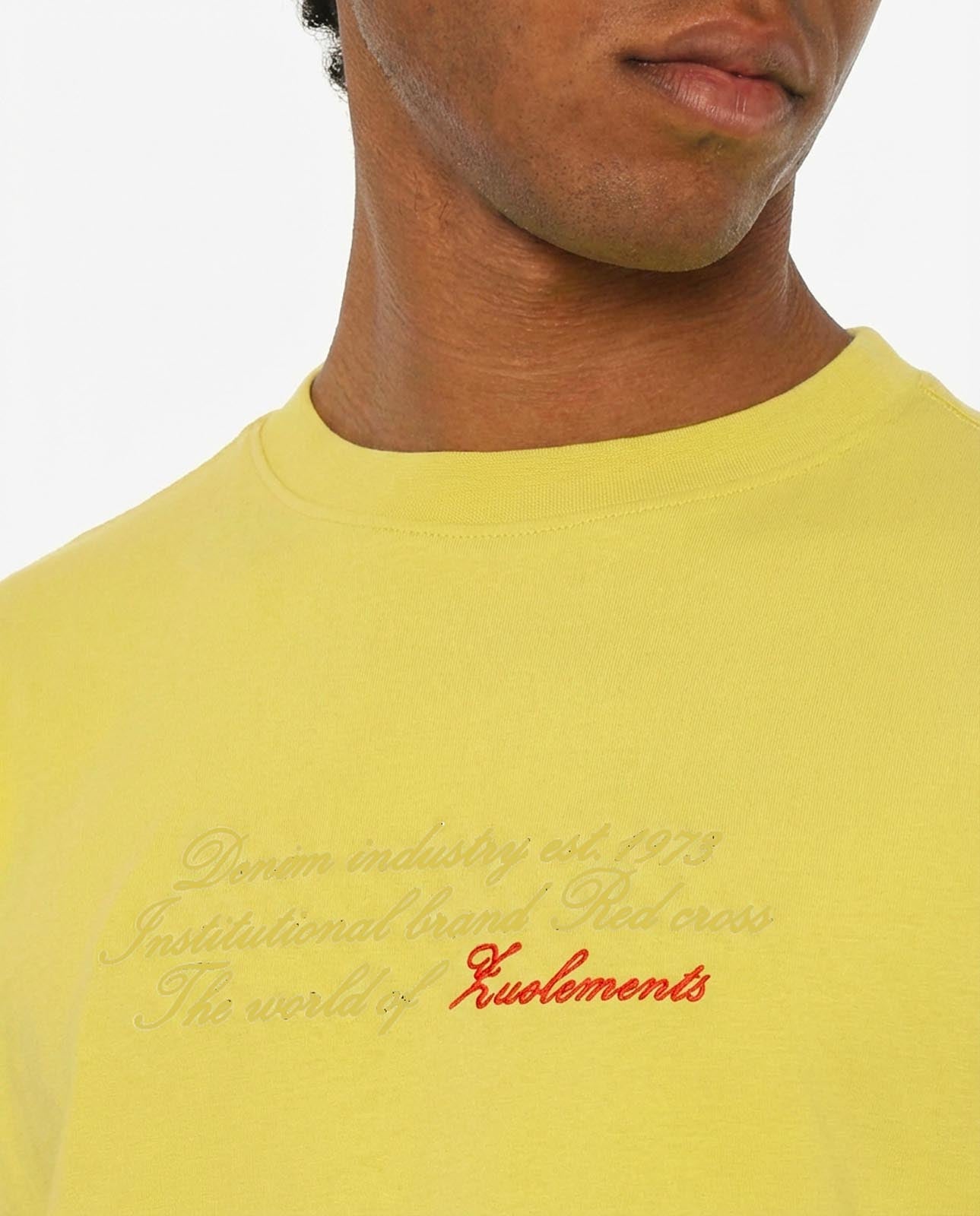 T-shirt girocollo maniche corte relaxed fit con taglio spalla e ricamo frontale