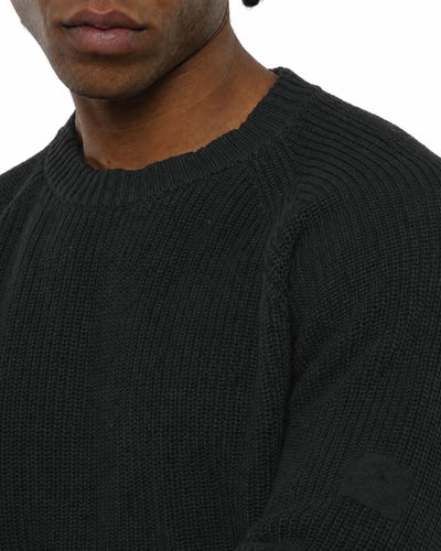 Maglia girocollo manica raglan con patch ricamato