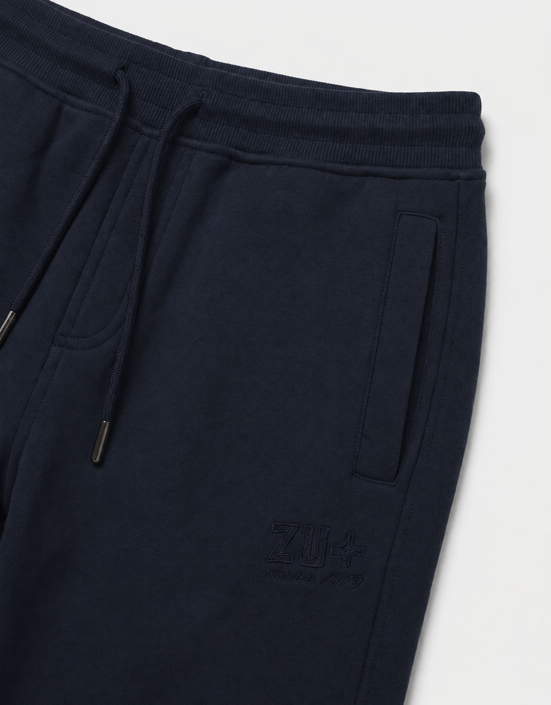 Pantaloni in felpa con ricamo in tono