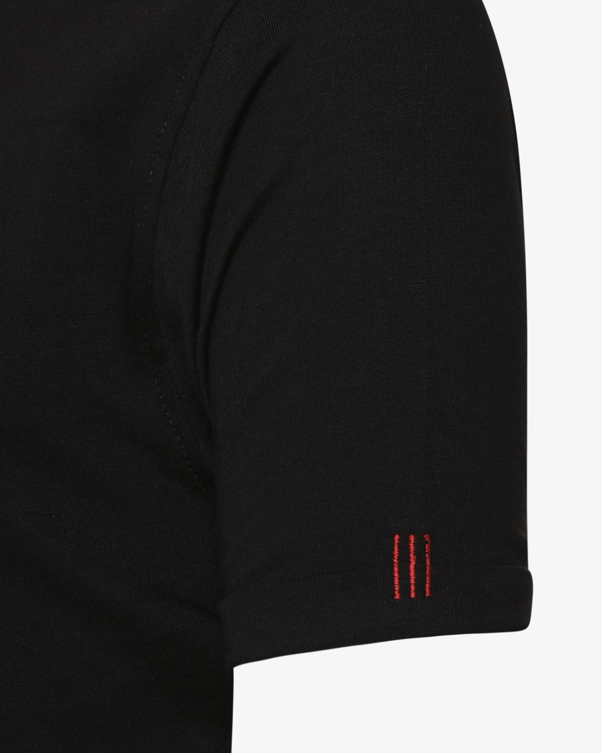 T-shirt con ricamo su manica