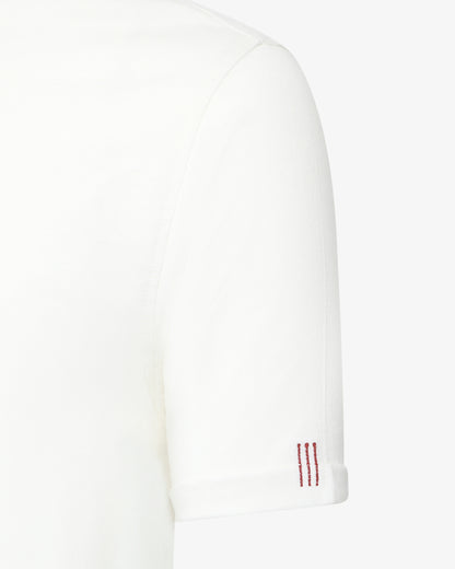 T-shirt con ricamo su manica