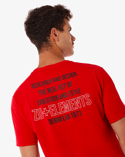 T-shirt con micrologo e stampa sul retro