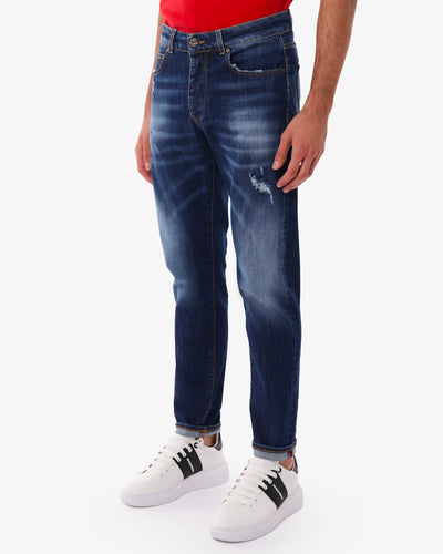 Jeans slim fit blu scuro con rotture