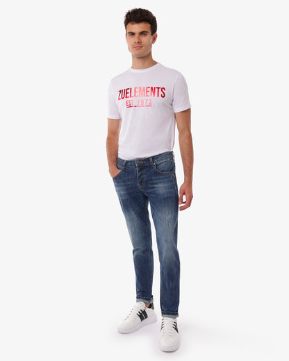Jeans slim fit blu con accessori logati