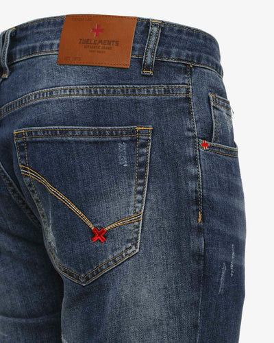 Jeans slim fit blu con accessori logati