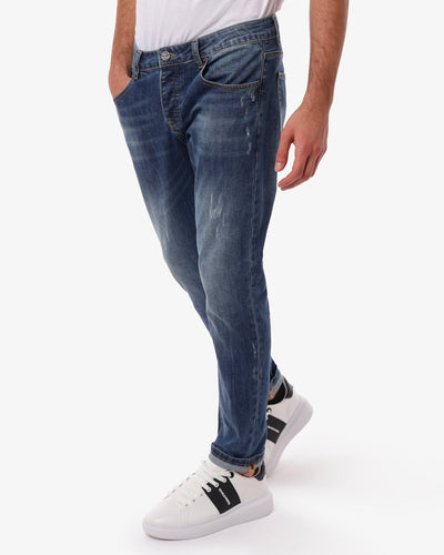 Jeans slim fit blu con accessori logati