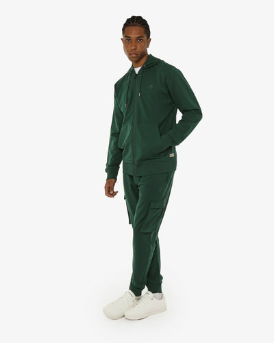 Felpa zip con cappuccio, logo ricamato lato cuore. Polso e fondo a coste