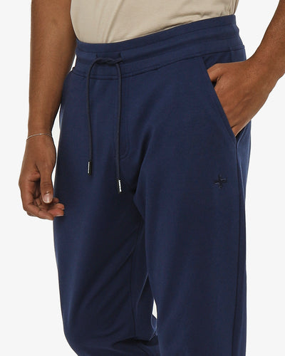 Pantaloni felpa con logo ricamato sul davanti, vita e fondo a coste