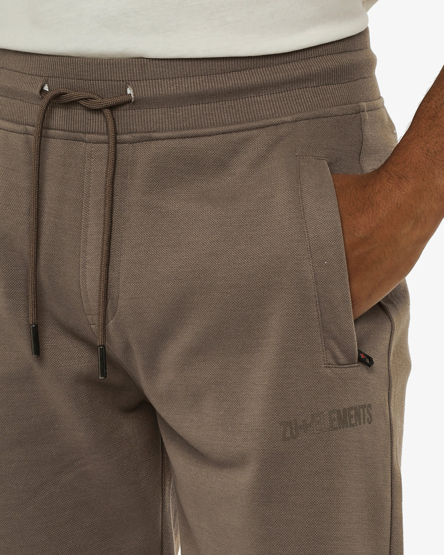 Pantaloni felpa in piquet con tasche con zip