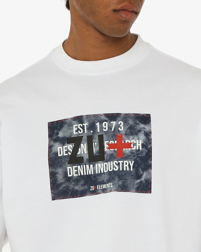 T-shirt girocollo maniche corte relaxed fit, taglio spalla e stampa frontale – Optical Black