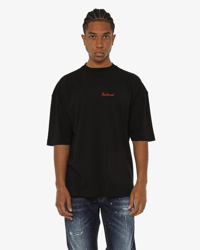 T-shirt girocollo maniche corte relaxed fit con taglio spalla e ricamo frontale