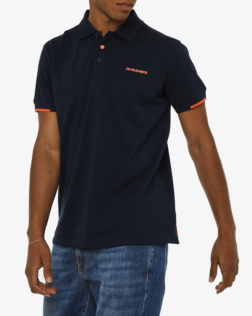 Polo in piquet con profili fluo e logo stampato lato cuore