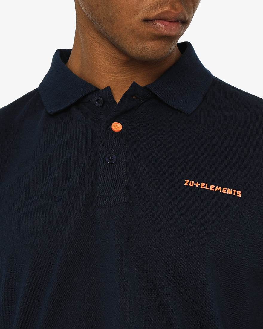 Polo in piquet con profili fluo e logo stampato lato cuore