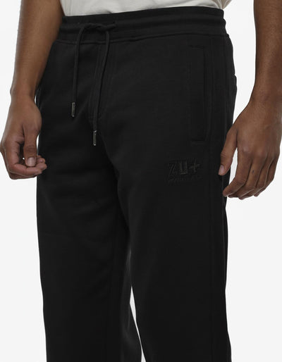 Pantaloni in felpa con ricamo in tono
