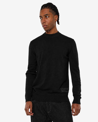 Maglia mezzo collo in viscosa con ricamo sul fondo