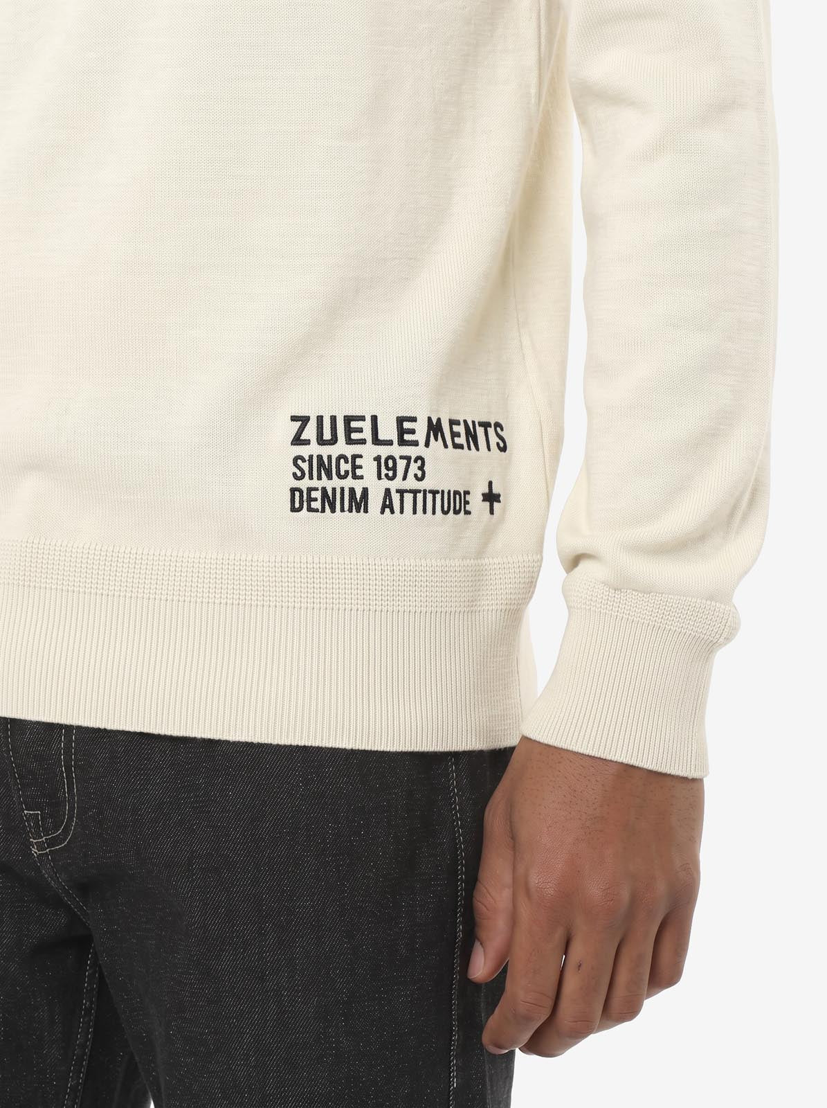 Maglia mezzo collo in viscosa con ricamo sul fondo