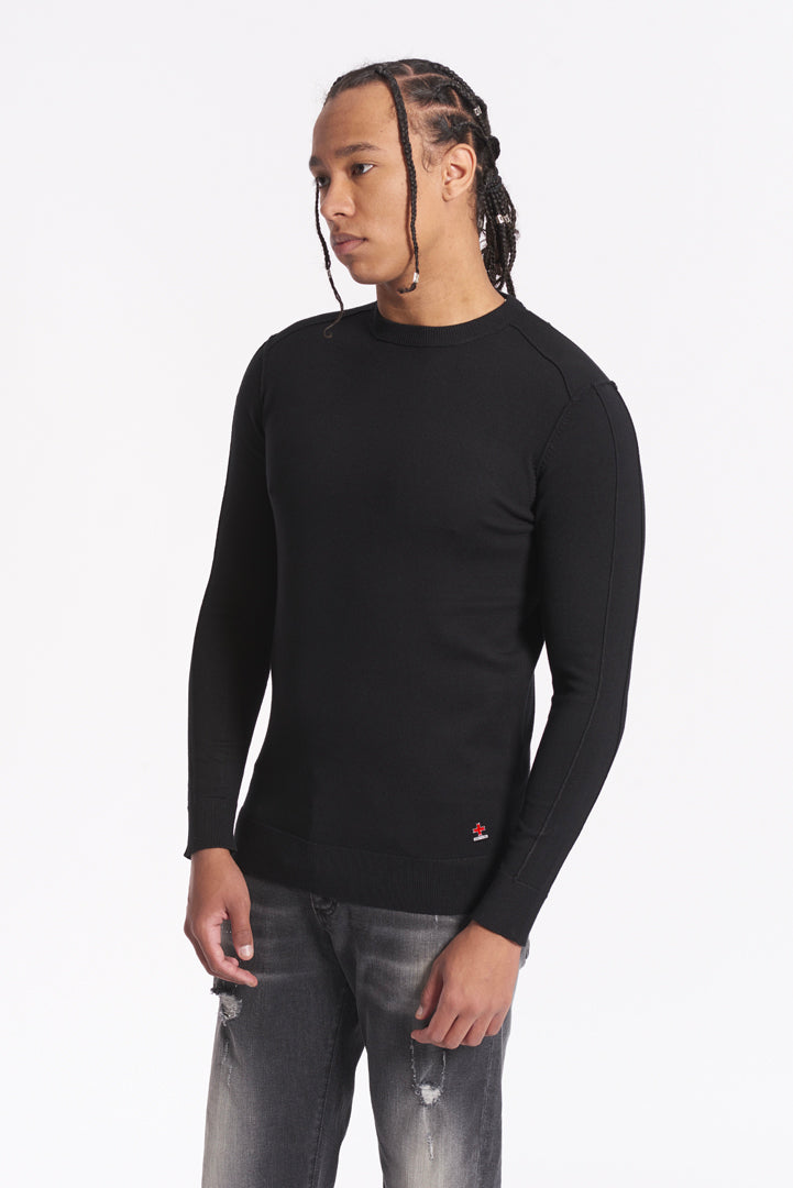 Crewneck sweater with metal logo application