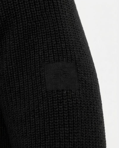 Maglia girocollo manica raglan con patch ricamato