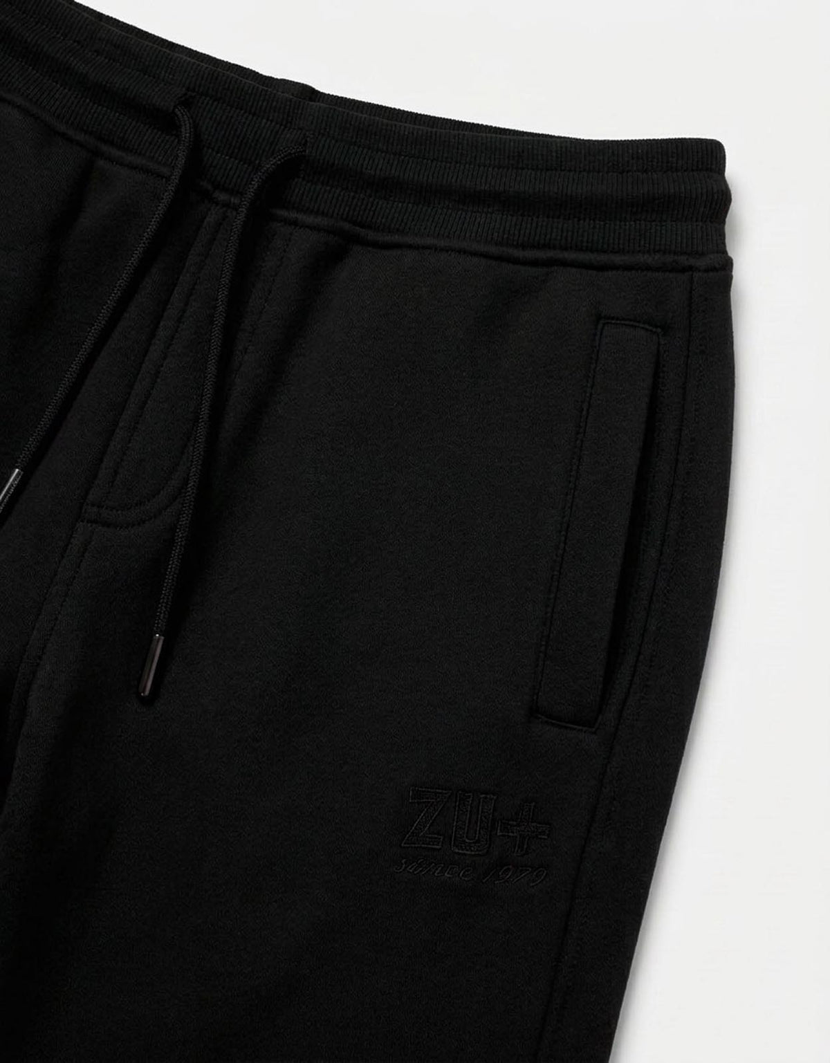 Pantaloni in felpa con ricamo in tono