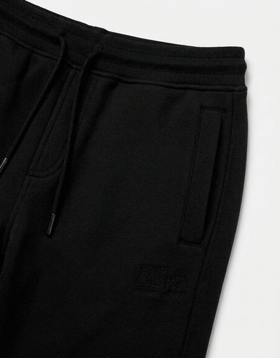 Pantaloni in felpa con ricamo in tono