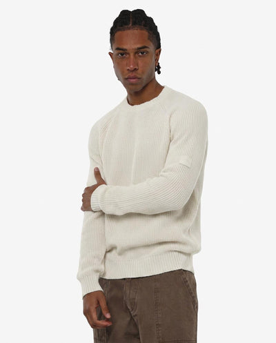 Maglia girocollo manica raglan con patch ricamato