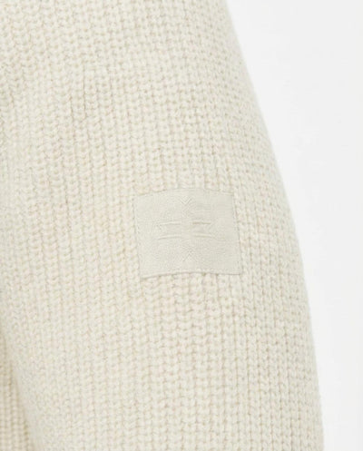 Maglia girocollo manica raglan con patch ricamato