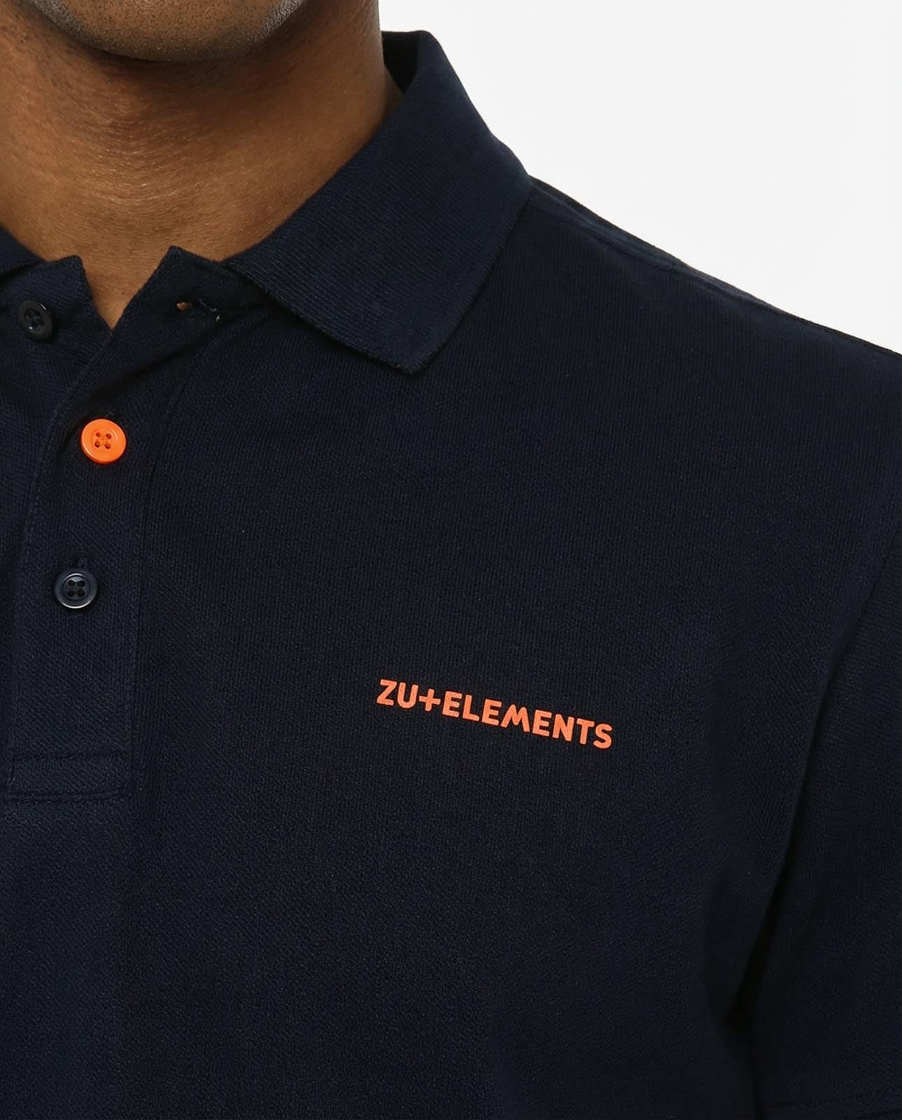 Polo in piquet con profili fluo e logo stampato lato cuore