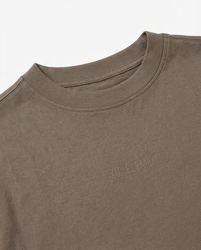 T-shirt girocollo maniche corte relaxed fit, taglio spalla e stampa frontale