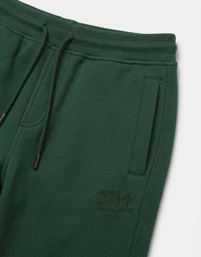 Pantaloni in felpa con ricamo in tono