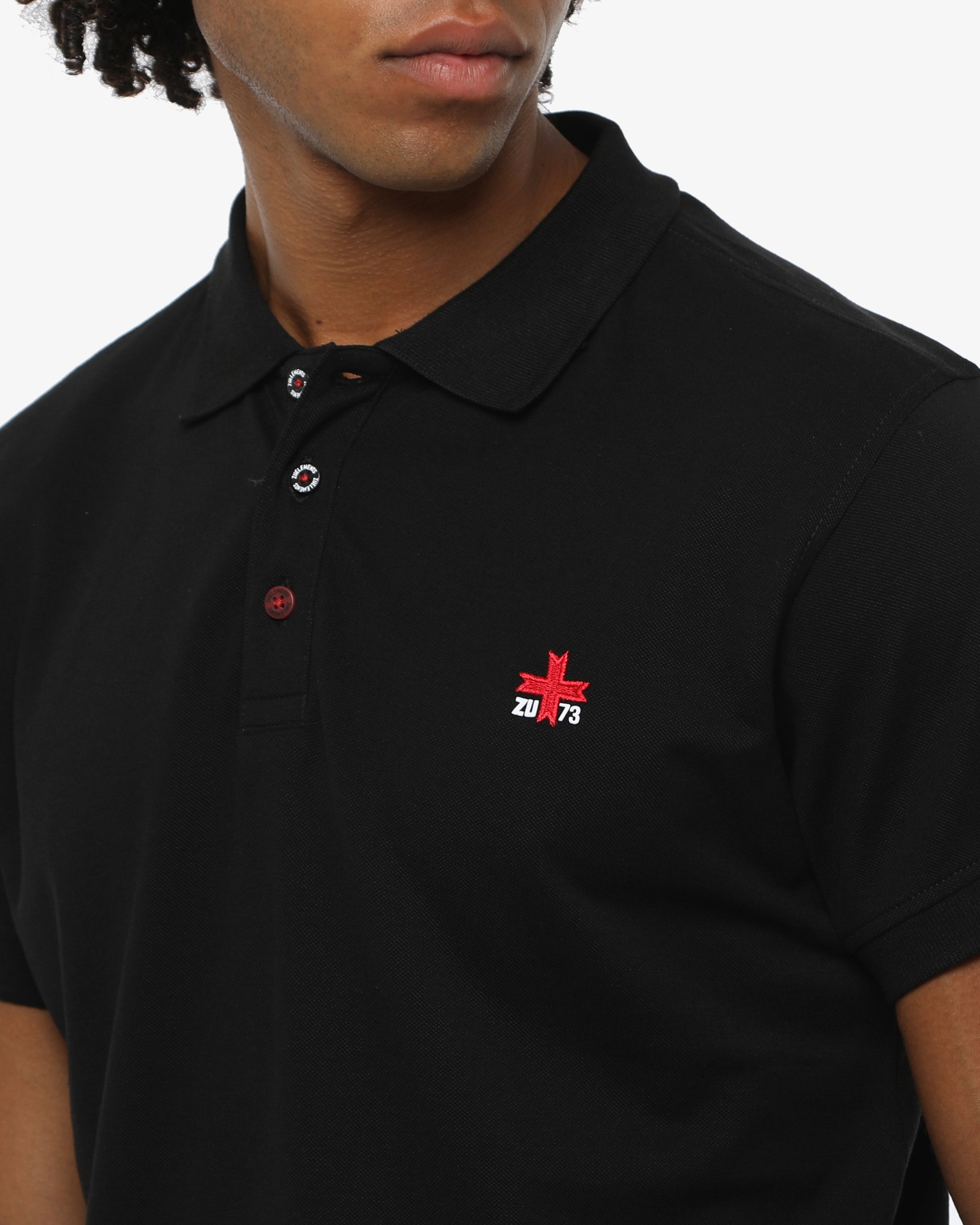 Polo piquet in puro cotone con logo ricamato e bottoni logati