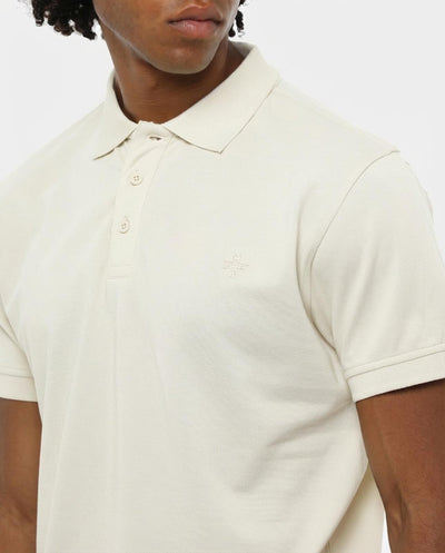 Polo in piquet con logo ricamato e dettagli sul fondo