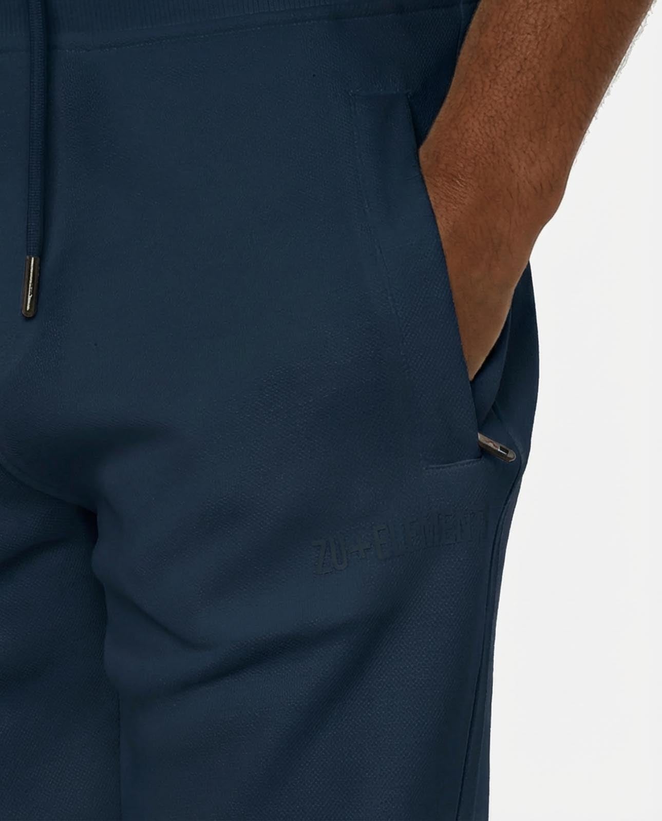 Bermuda felpa in piquet, tasche con zip, stampa laterale