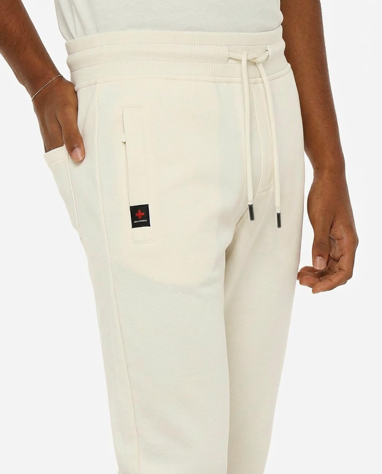 Pantaloni felpa in piquet con tasche con zip
