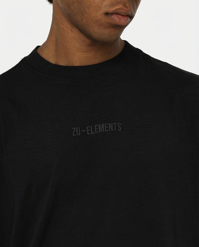 T-shirt girocollo maniche corte relaxed fit, taglio spalla e stampa frontale