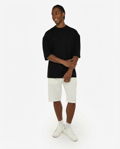 T-shirt girocollo maniche corte relaxed fit, taglio spalla e stampa frontale