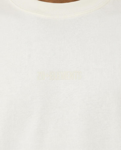 T-shirt girocollo maniche corte relaxed fit, taglio spalla e stampa frontale