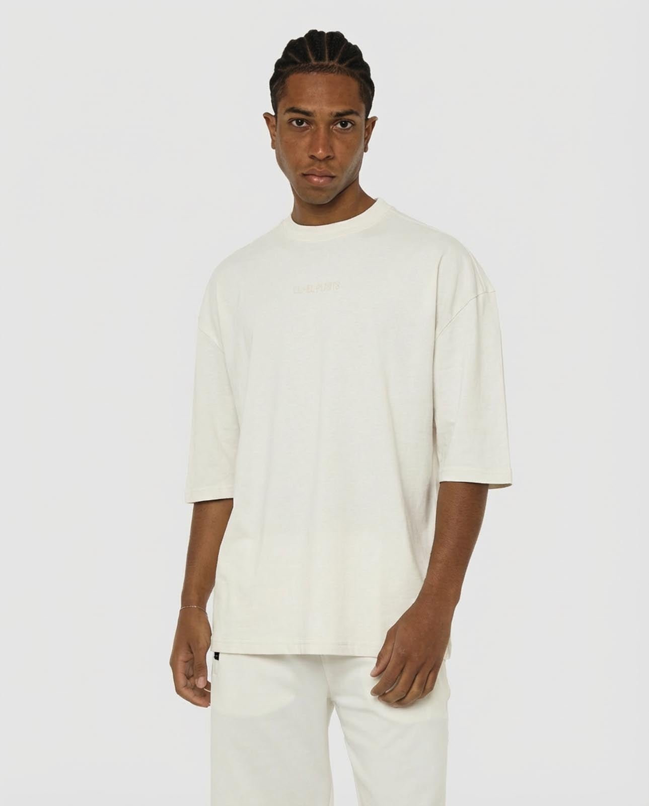 T-shirt girocollo maniche corte relaxed fit, taglio spalla e stampa frontale