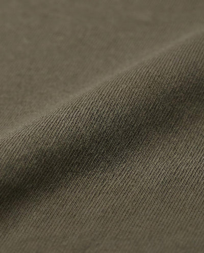 T-shirt girocollo maniche corte, ricamo lato cuore e taglio sul dietro