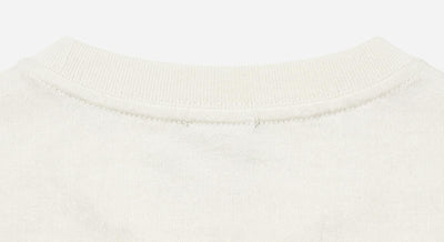 T-shirt girocollo maniche corte, ricamo lato cuore e taglio sul dietro