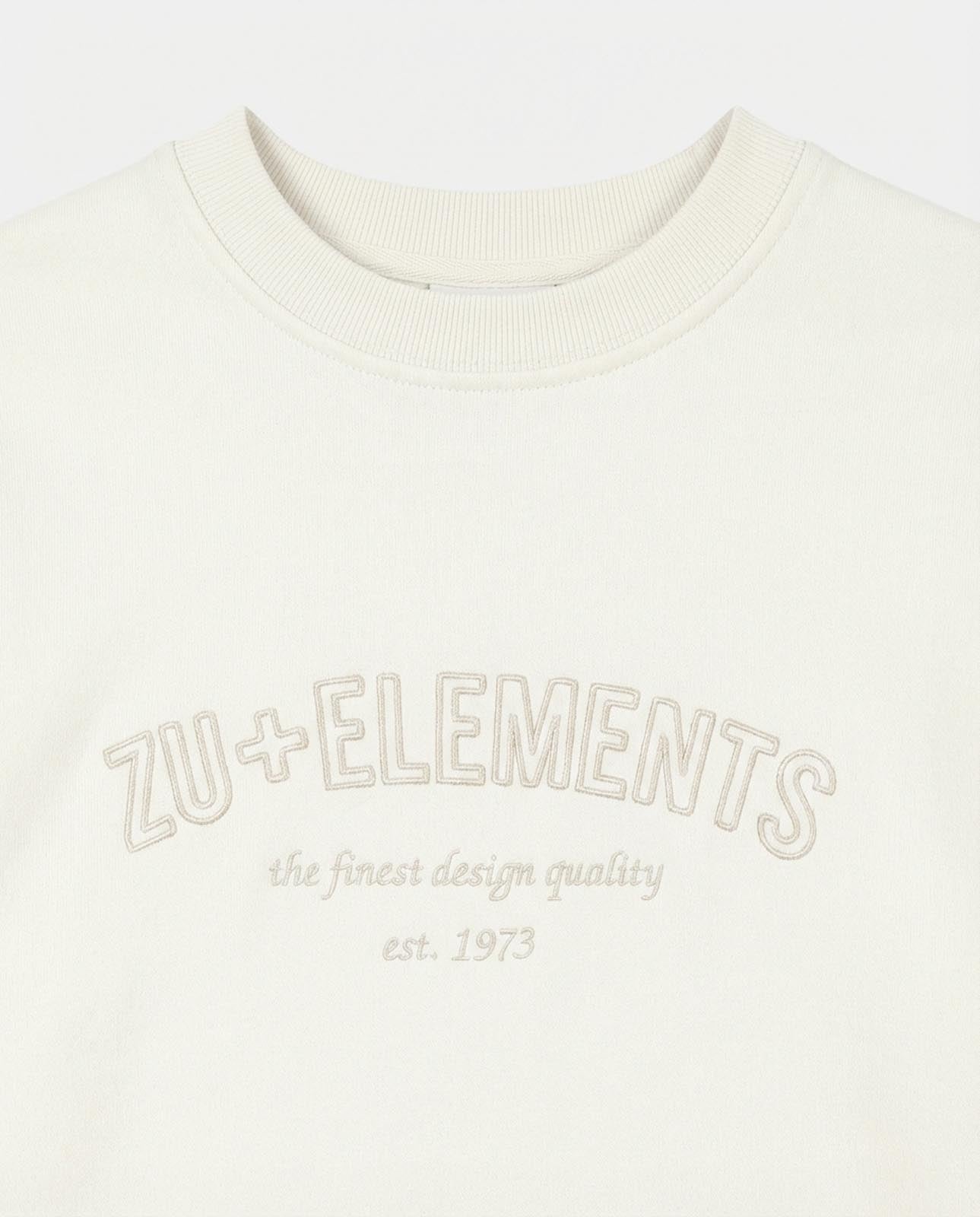 Felpa girocollo con applicazione frontale in tono ricamata