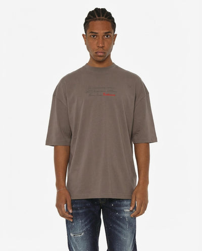 T-shirt girocollo maniche corte relaxed fit con taglio spalla e ricamo frontale