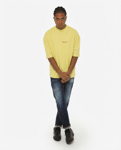 T-shirt girocollo maniche corte relaxed fit con taglio spalla e ricamo frontale