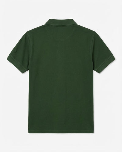 Polo in piquet garment dye, ricamo in tono su manica